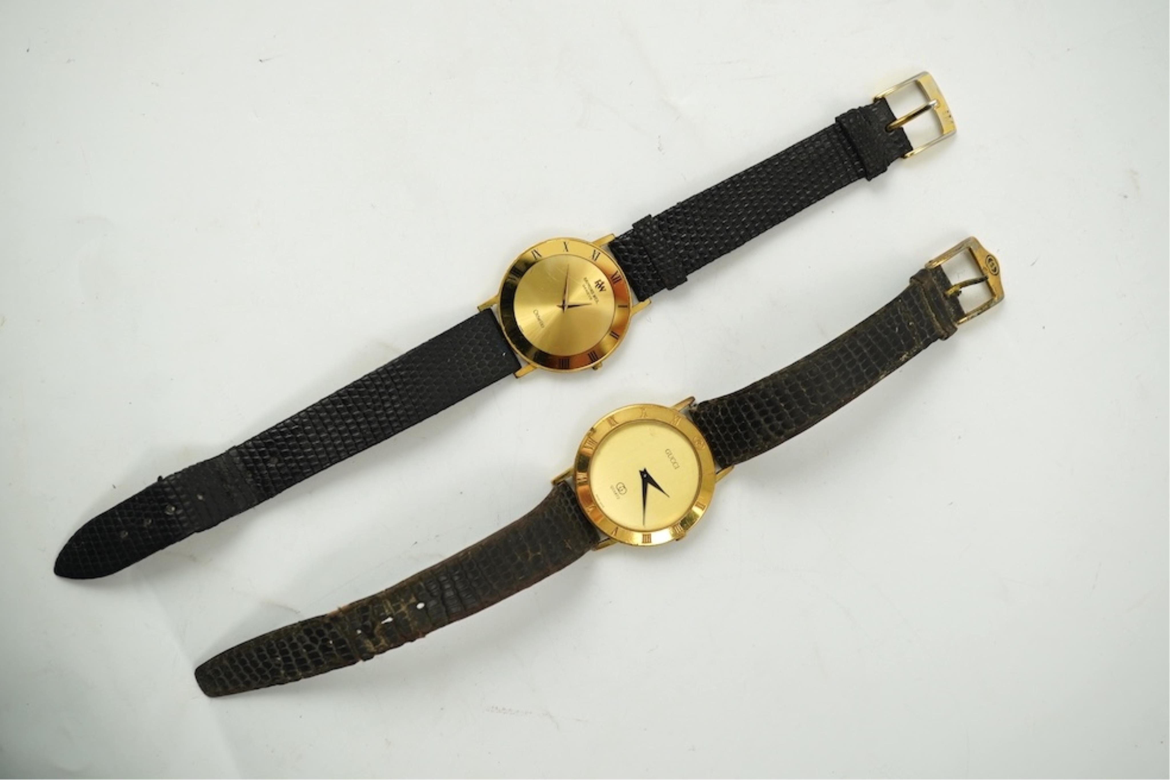 A gentleman's recent 18k gold electro-plated Raymond Weil quartz dress wrist watch, case diameter 33mm and a similar Gucci quartz dress wrist watch.